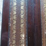 Folding table with a leather top