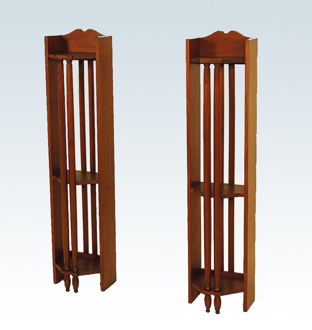 Pair of art deco mahogany wall columns
