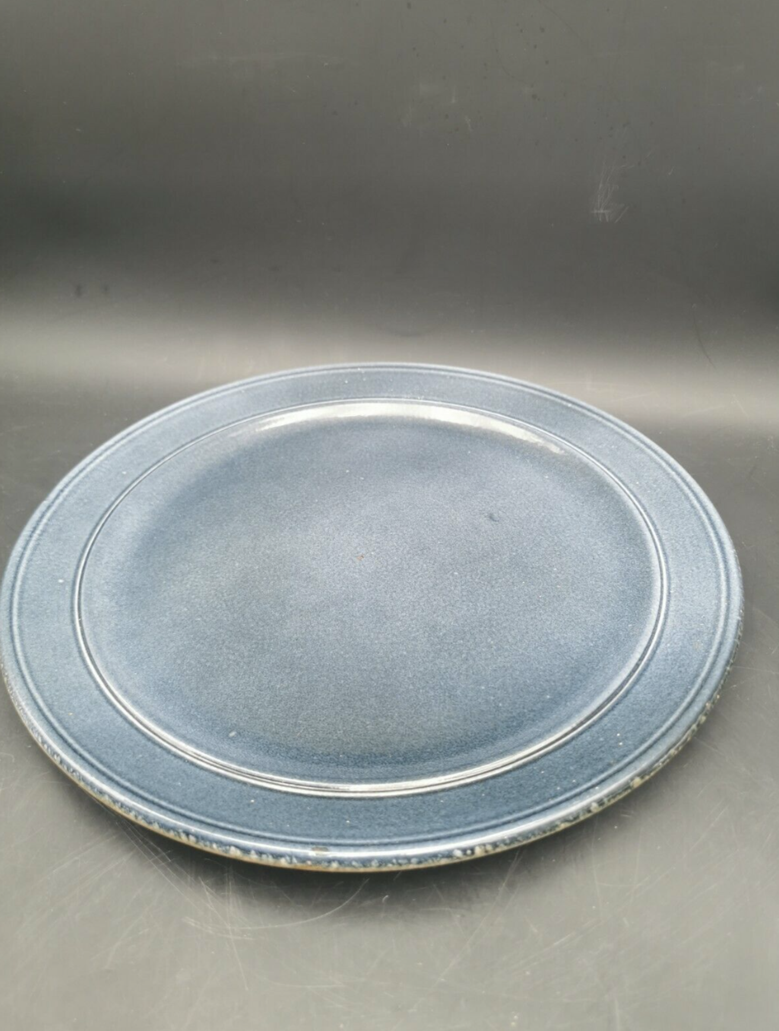 Blue ceramic bowl and its undercut