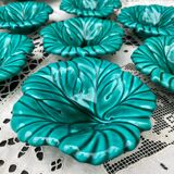 Salad bowl and small bowls in leaf-shaped slipware