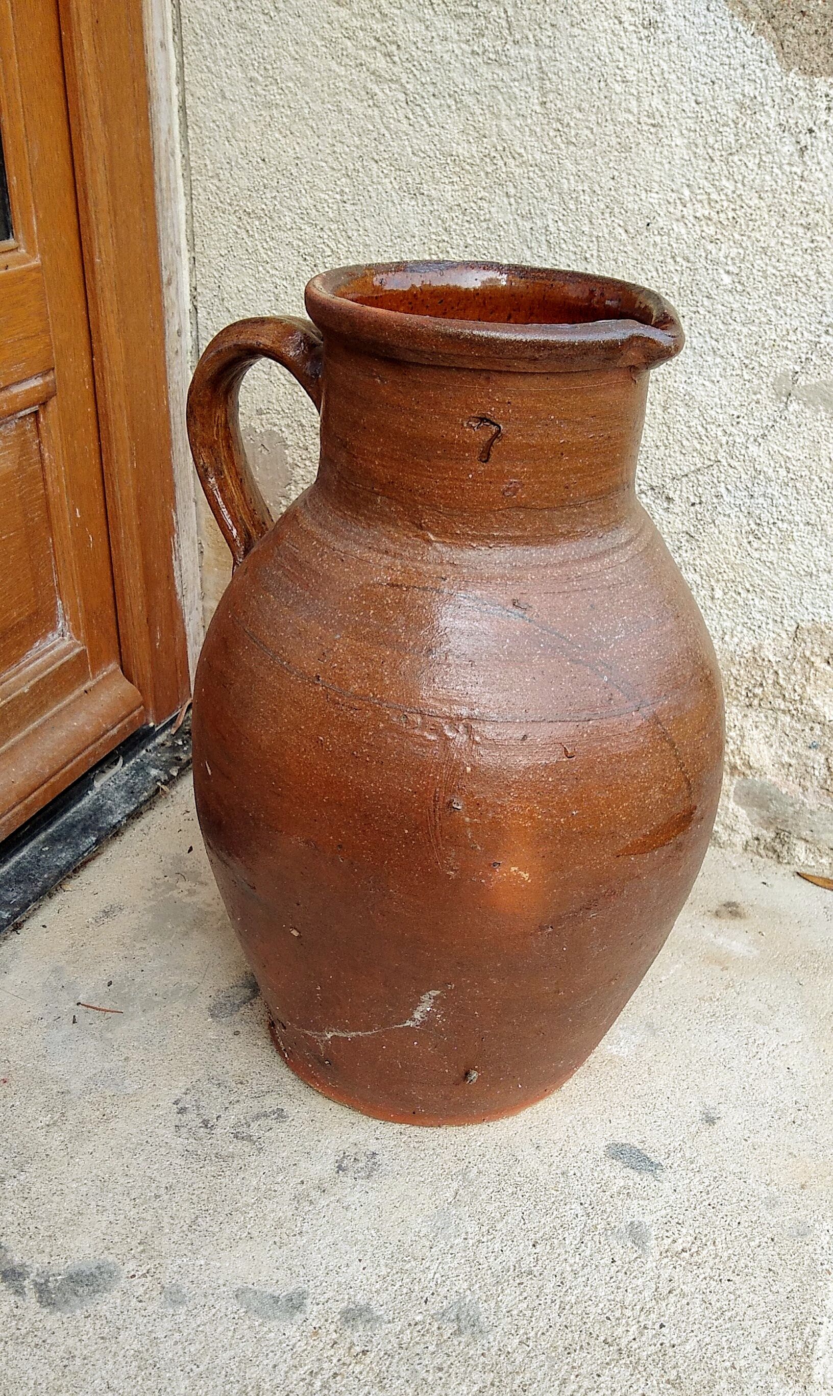 Glazed terracotta jug