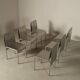 Set of six postmodernist stainless steel dining chairs from circa 1980-1990.