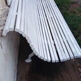 Cast iron and wooden slat garden bench from the early 20th century