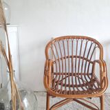 Pair of vintage rattan armchairs circa the 1970s.