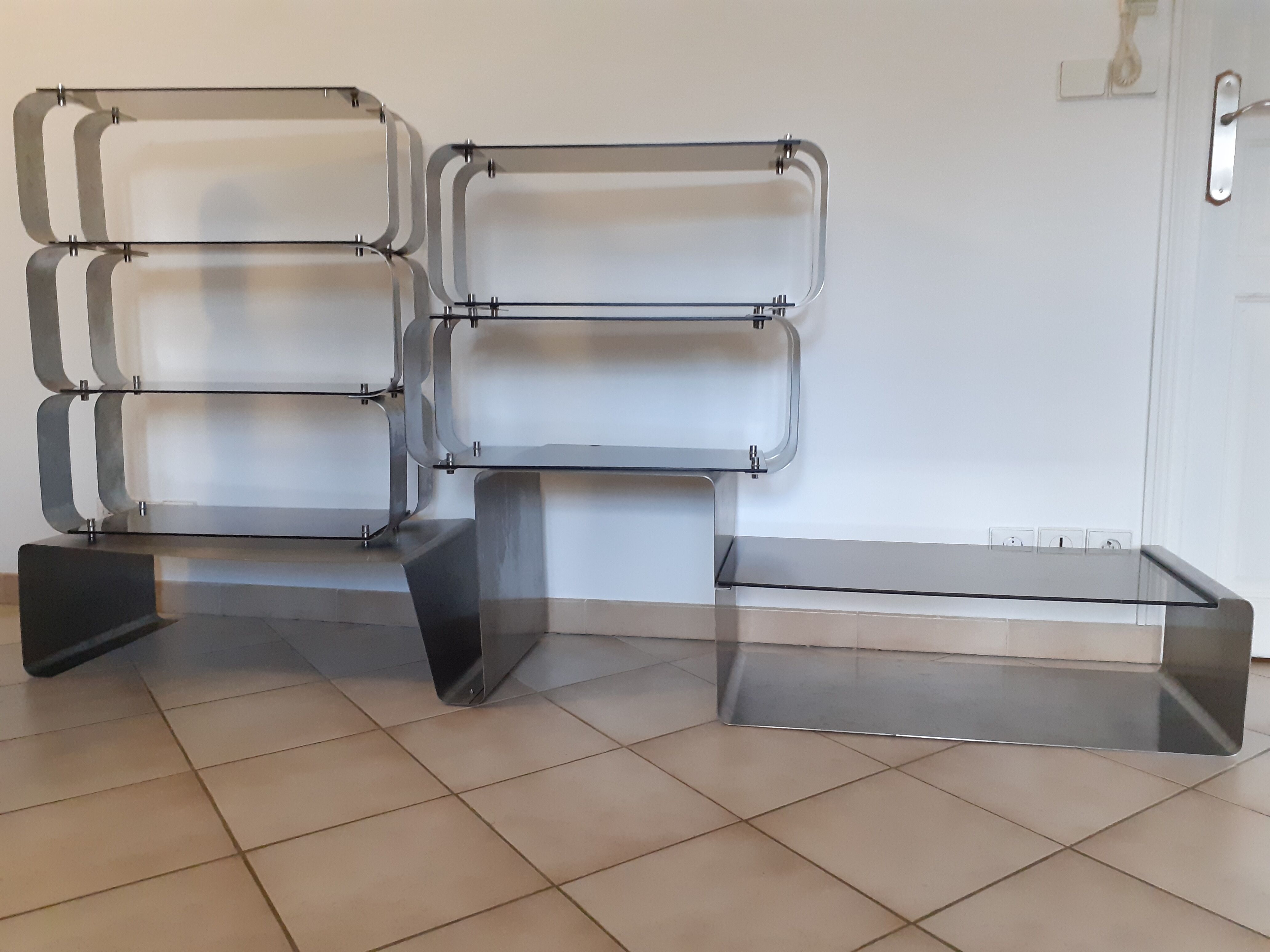 Modular wall shelves design 70s in smoked glass and brushed steel