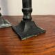 Pair of removable patinated brass candlesticks