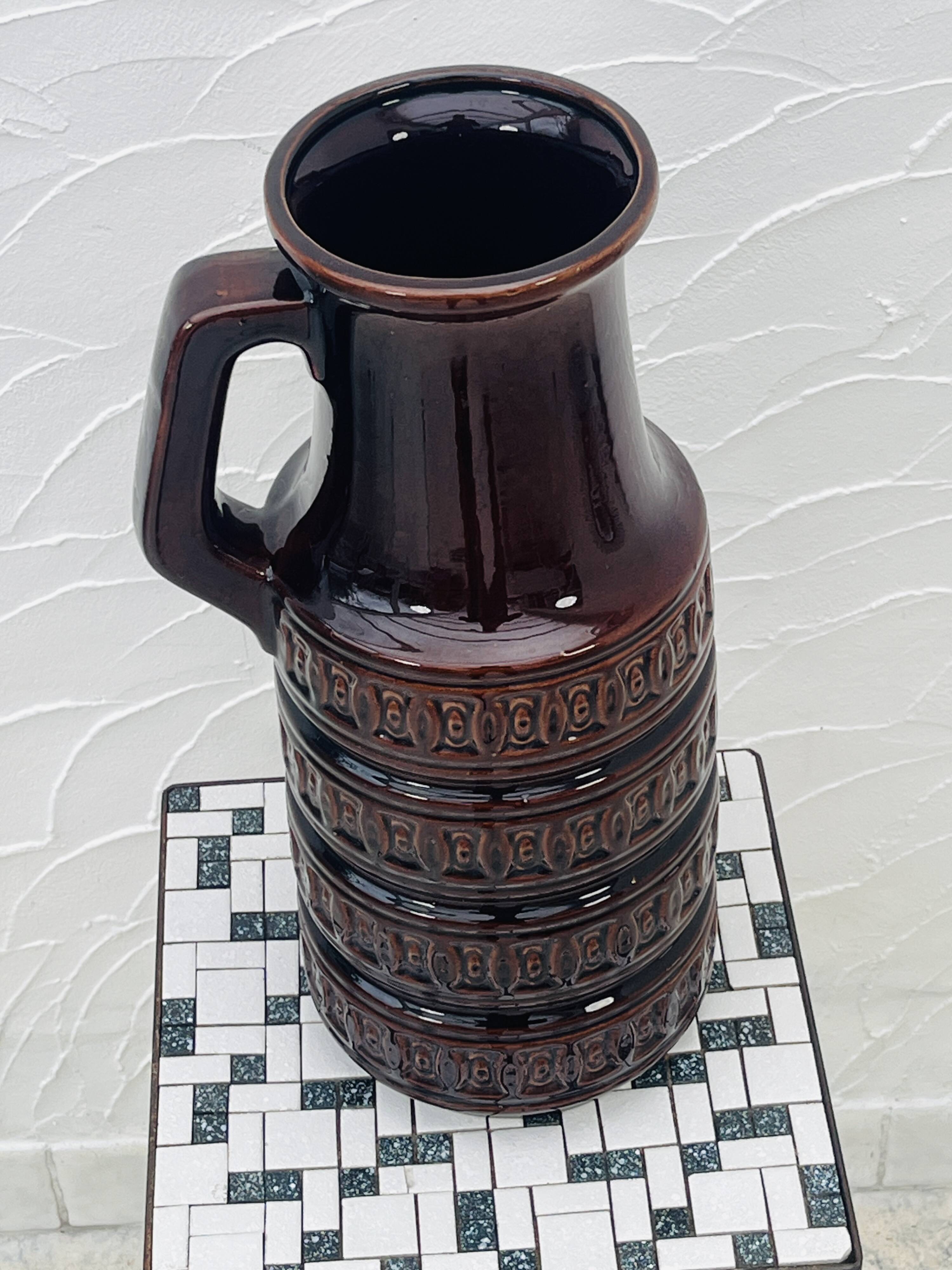 Vase West Germany brown with geometric relief from the 1970s.