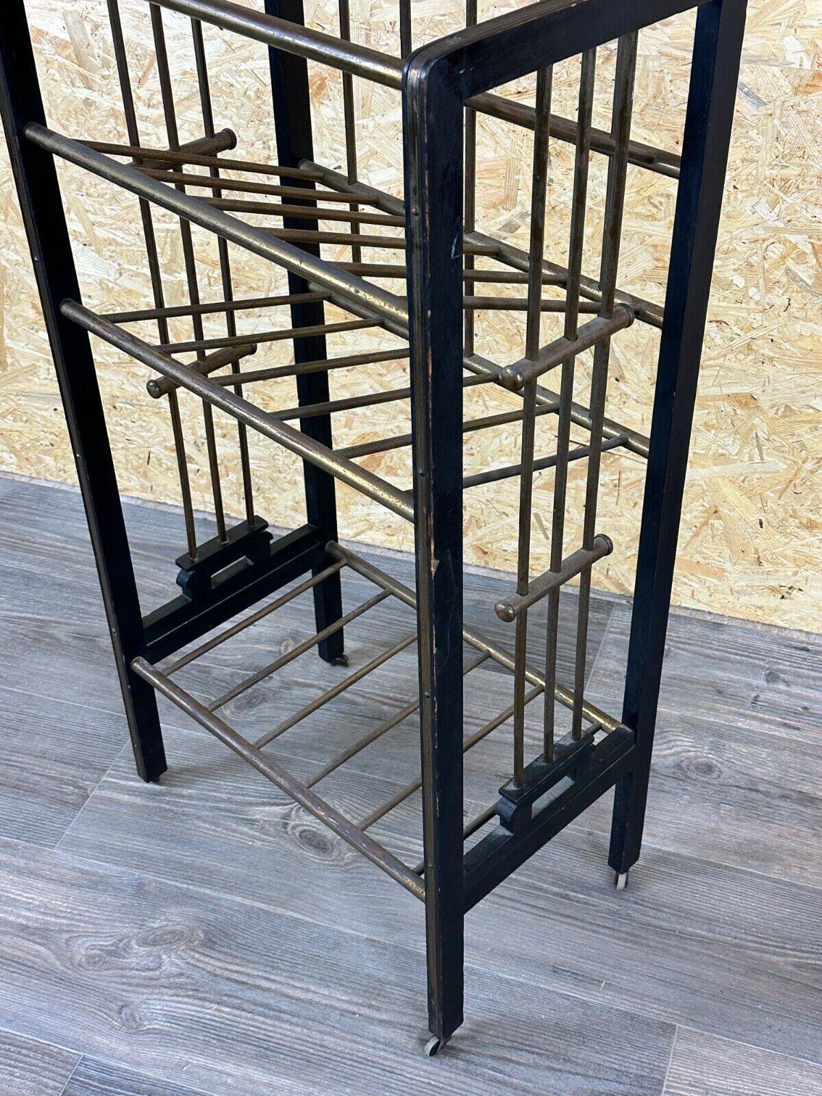Magazine rack from Wiener Werkstätte Austria made of mahogany & brass around 1900
