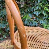 Set of four cane and webbing bar stools