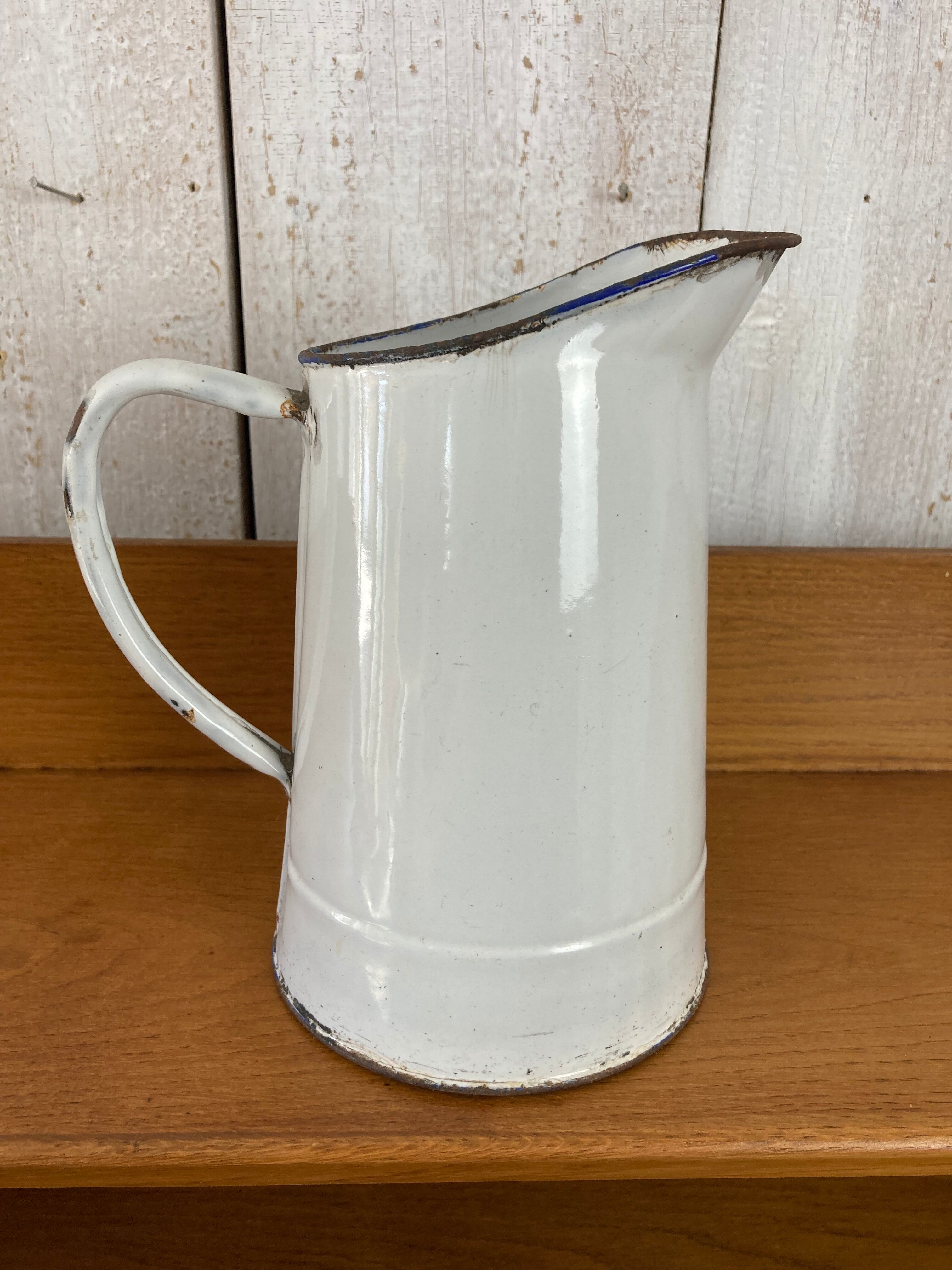 Enamelled pitcher