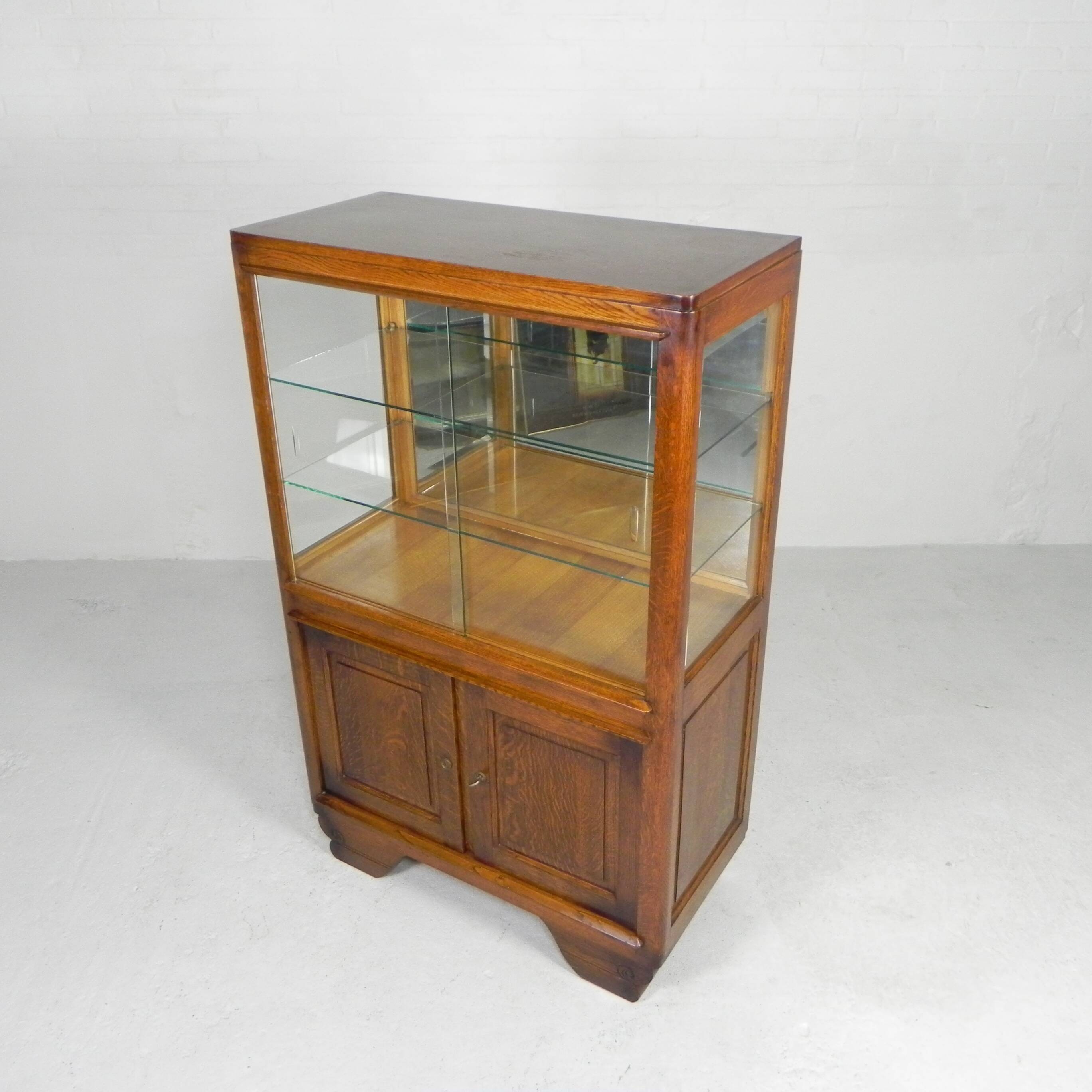Art Deco display cabinet with sliding glass doors
