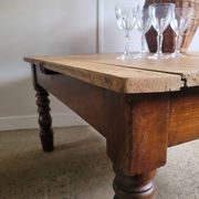 Wooden coffee table with turned legs