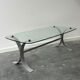 Design coffee table in brushed metal with a glass top, 1970s.
