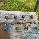 Set of 4 wooden and iron coat hooks from the 60s