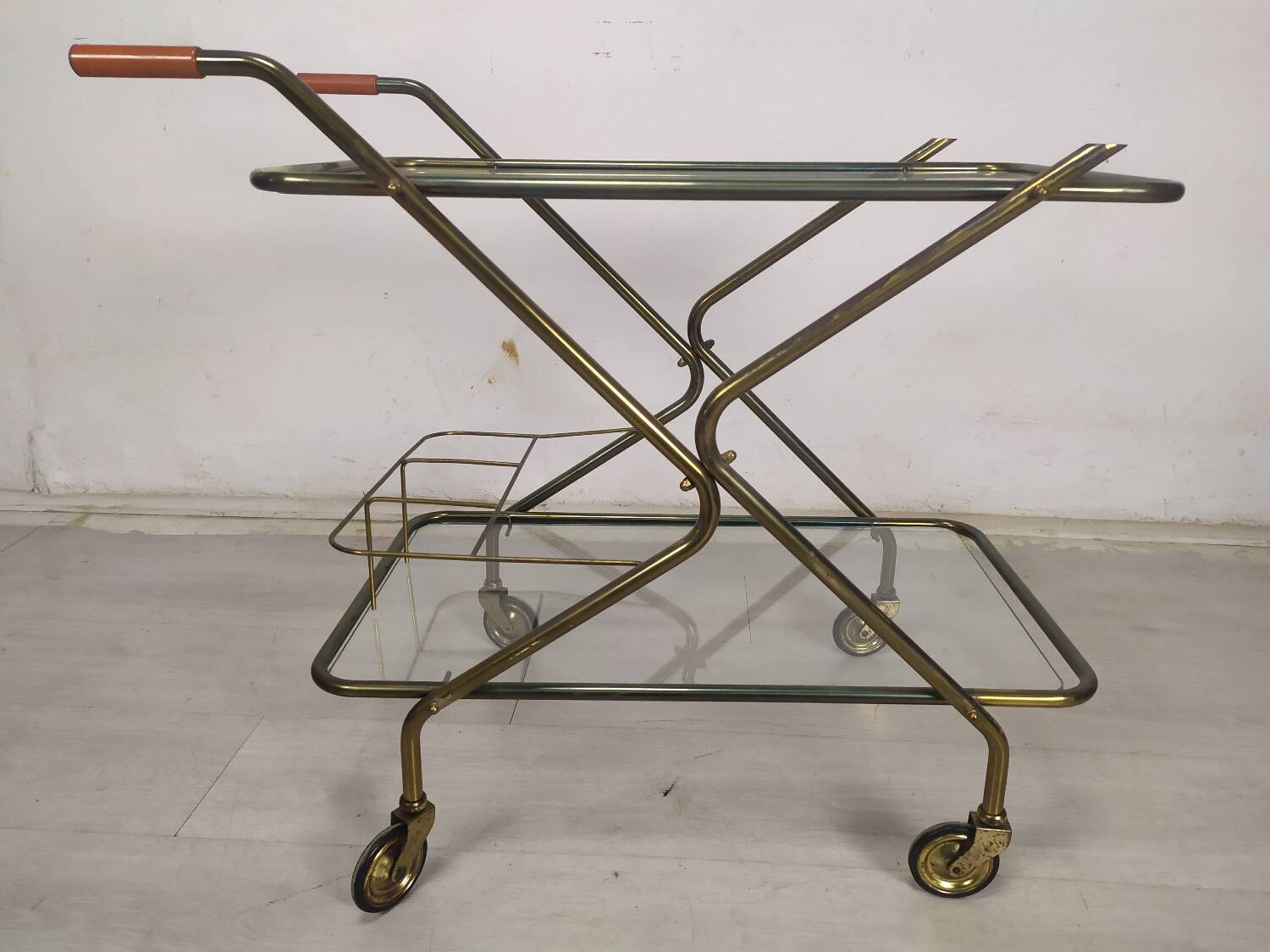 Vintage brass rolling cart