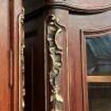 Pair of display cabinets in Louis XV style. Hand-painted in gold, carved from solid oak.