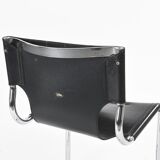 Black leather chairs by Carlo Bartoli