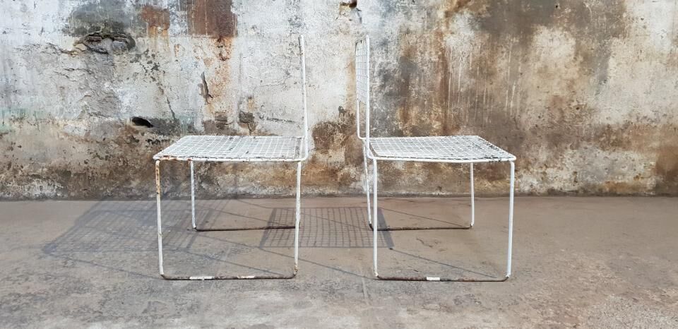Two vintage metal chairs