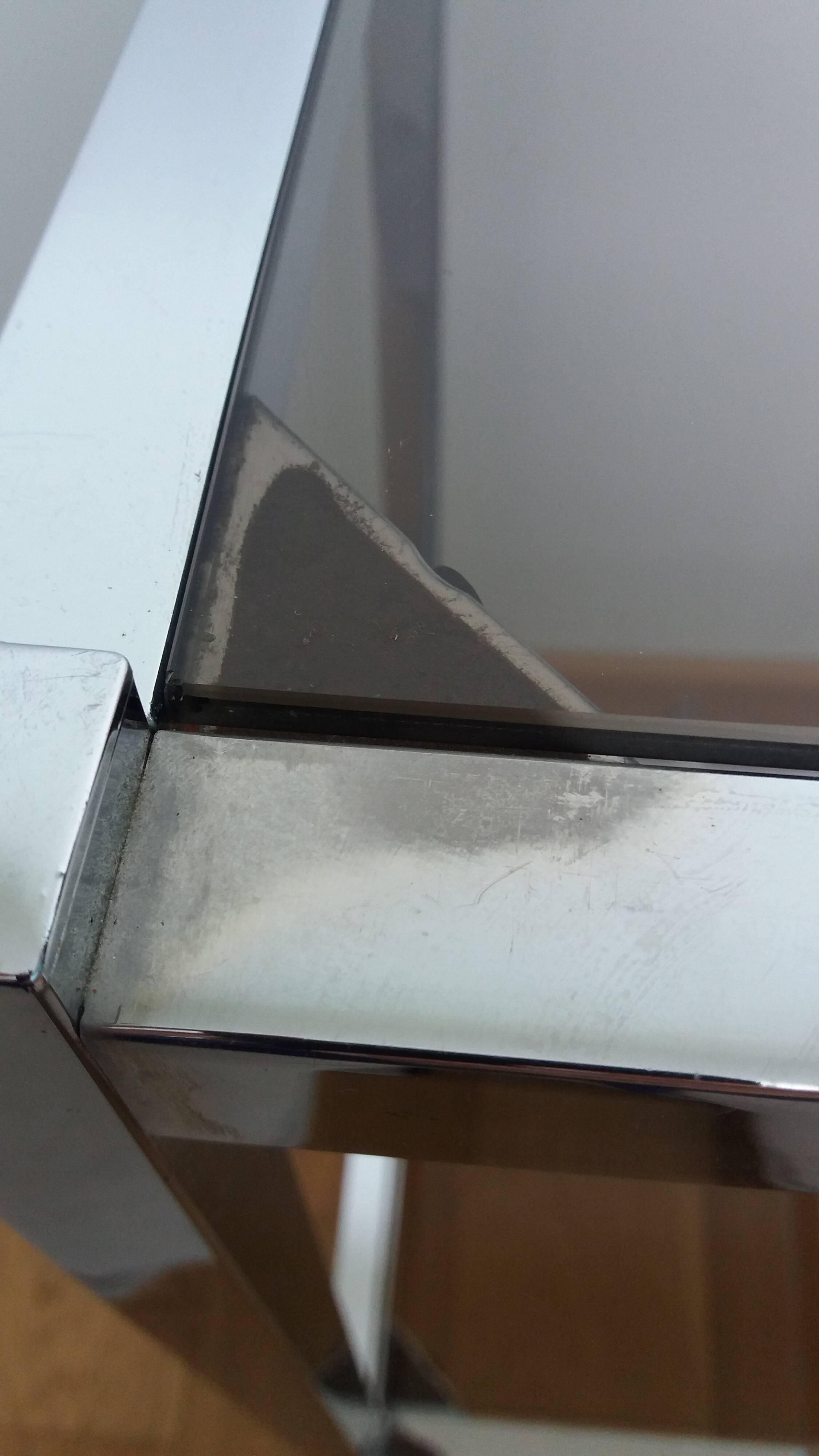 Chrome metal and smoked glass console