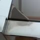 Chrome metal and smoked glass console