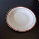 Round hollow serving plate in porcelain from Chastagner et Cie in good condition.