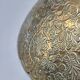 Engraved brass bowl from the mid-20th century with a scalloped edge.