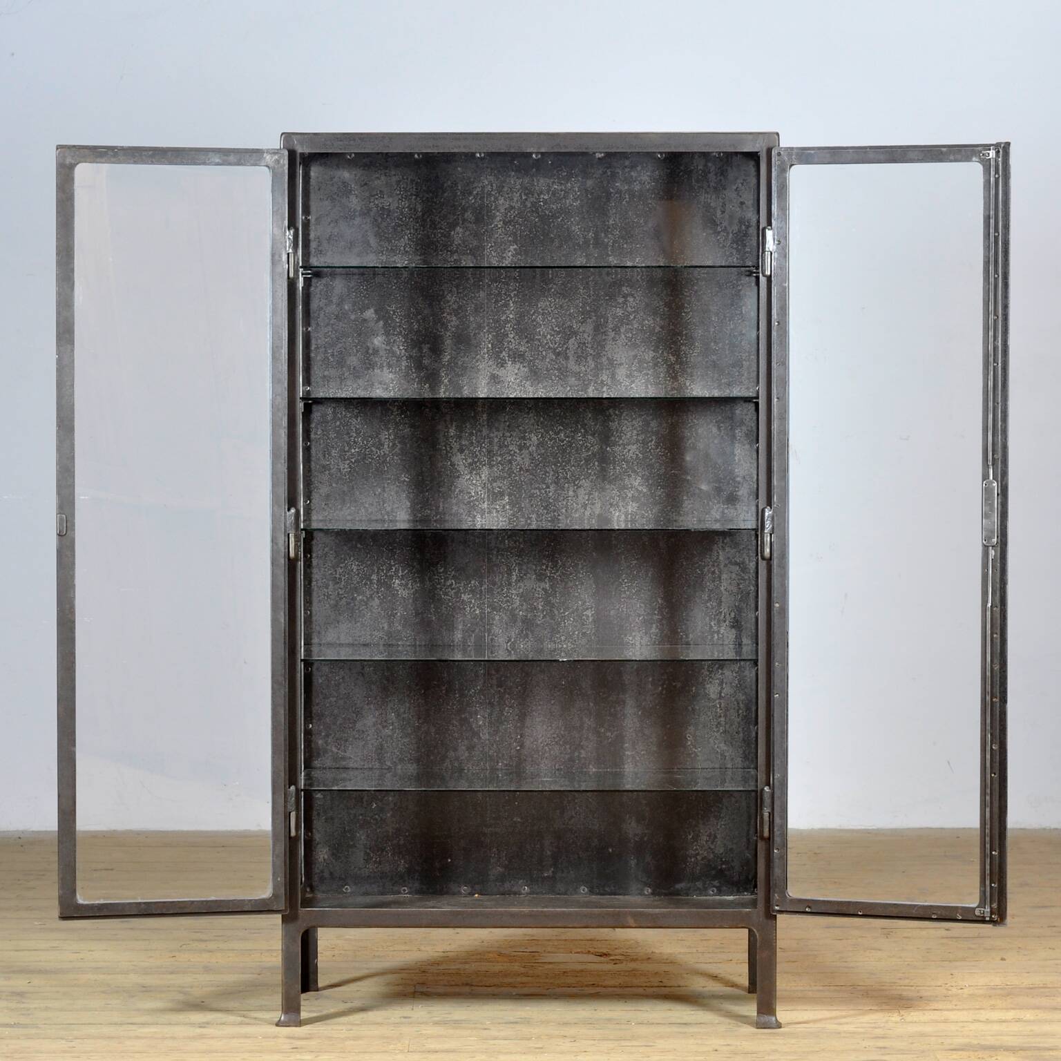 Polished iron medical cabinet, 1930s