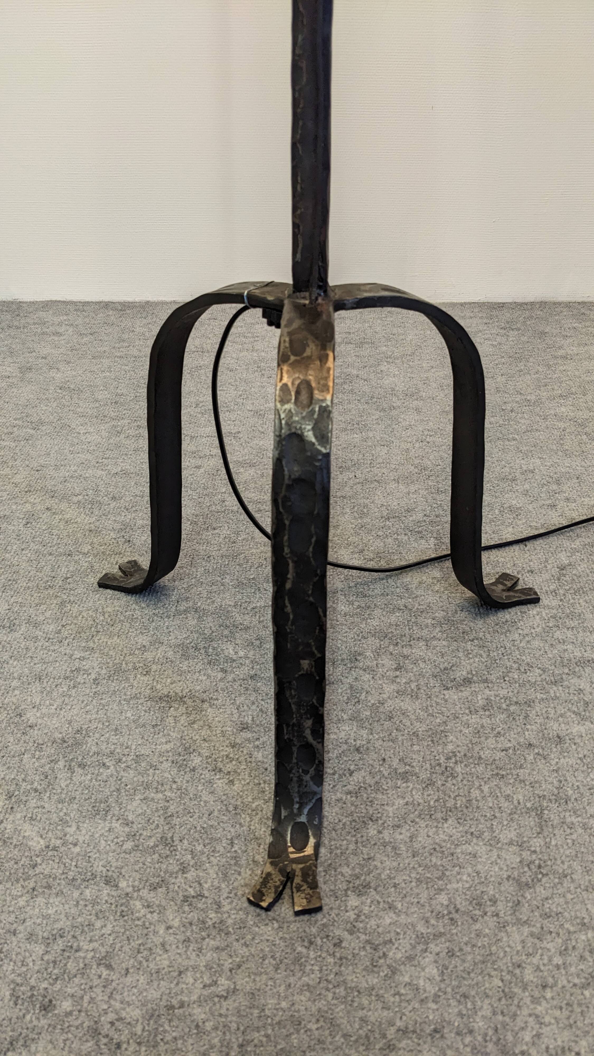 Brutalist tripod floor lamp with 3 lights in wrought iron, France circa 1950.
