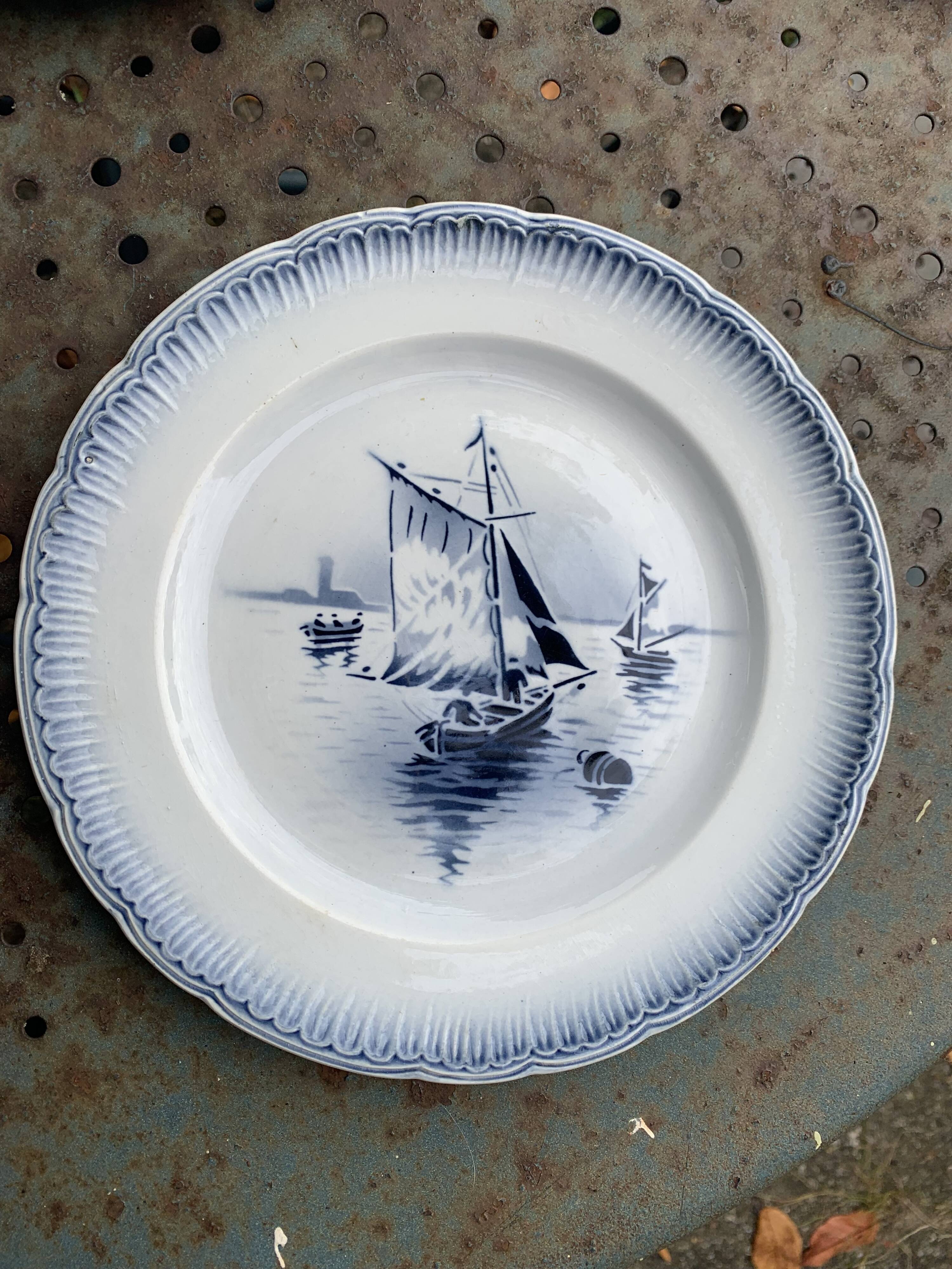 Set of 7 small dessert plates, Saint Amandinoire, Saint Amand decorated with sailboats