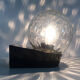 Vintage wall light plastic or bakelite structure, transparent glass globe. Year 70