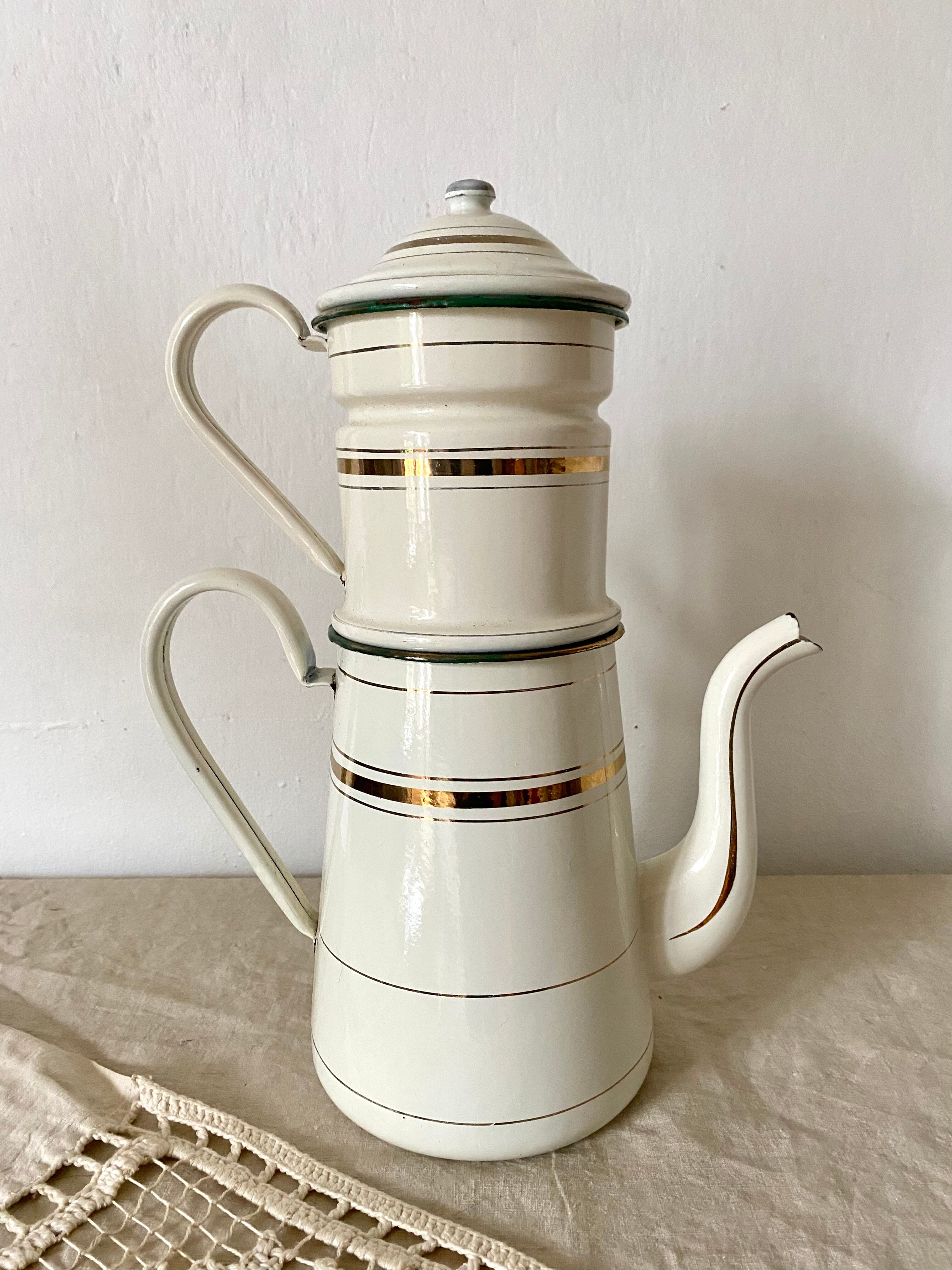 Antique coffee maker in enamelled sheet metal