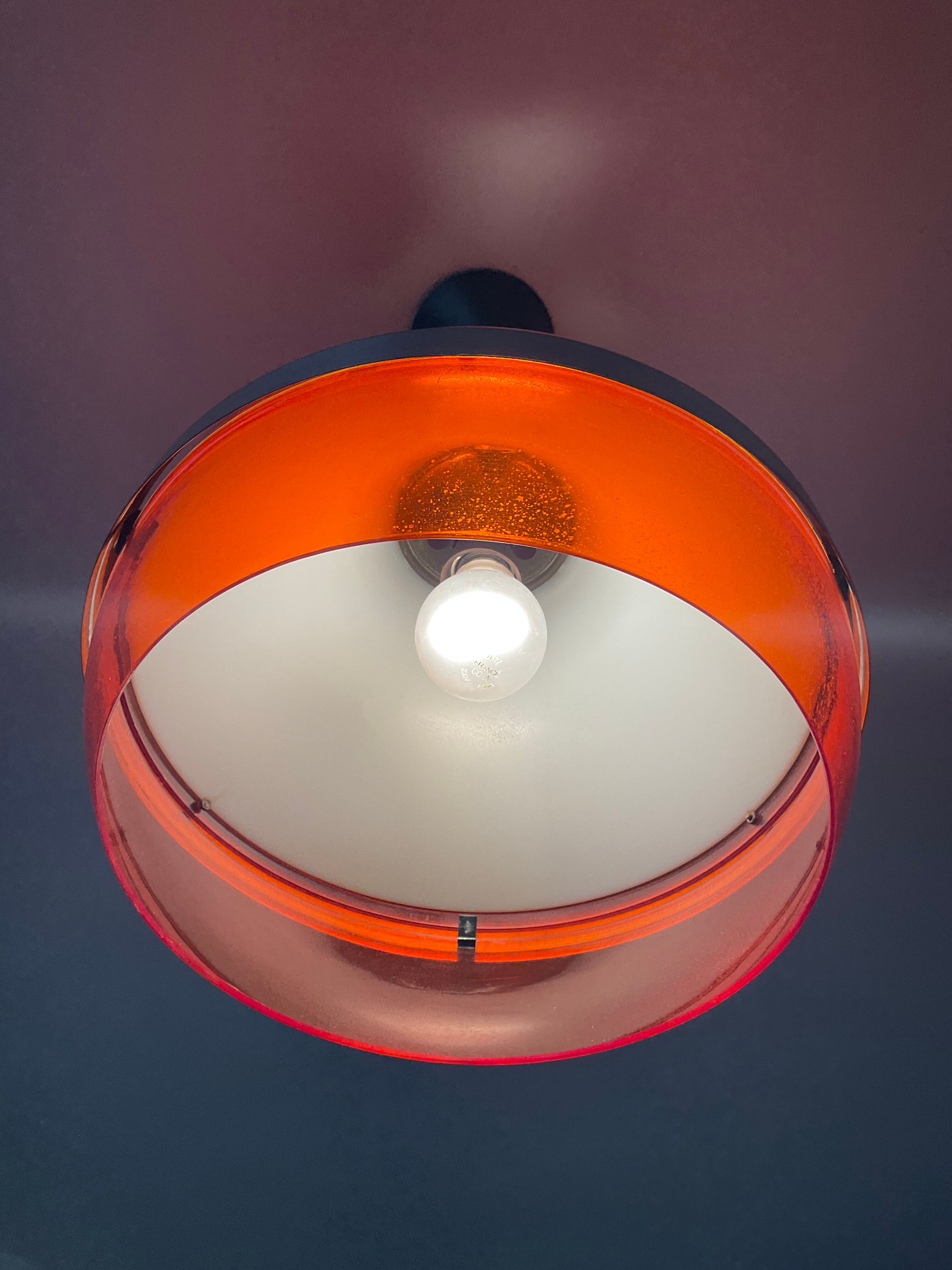 Space age pendant lamp in orange plexiglass and chromed metal