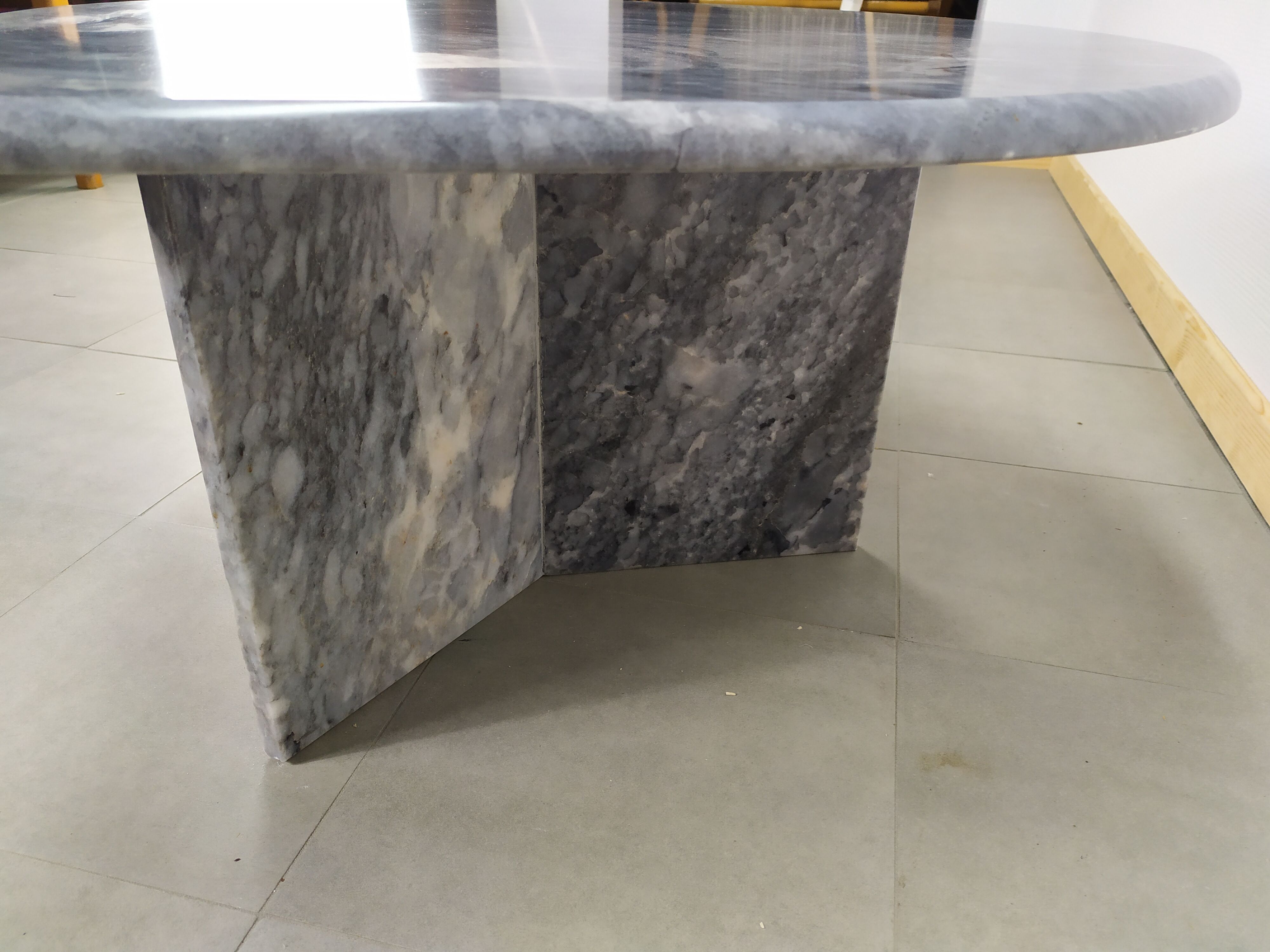 Grey marble coffee table tastes water