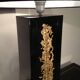 Large black lacquered lamp with gilt bronze decoration