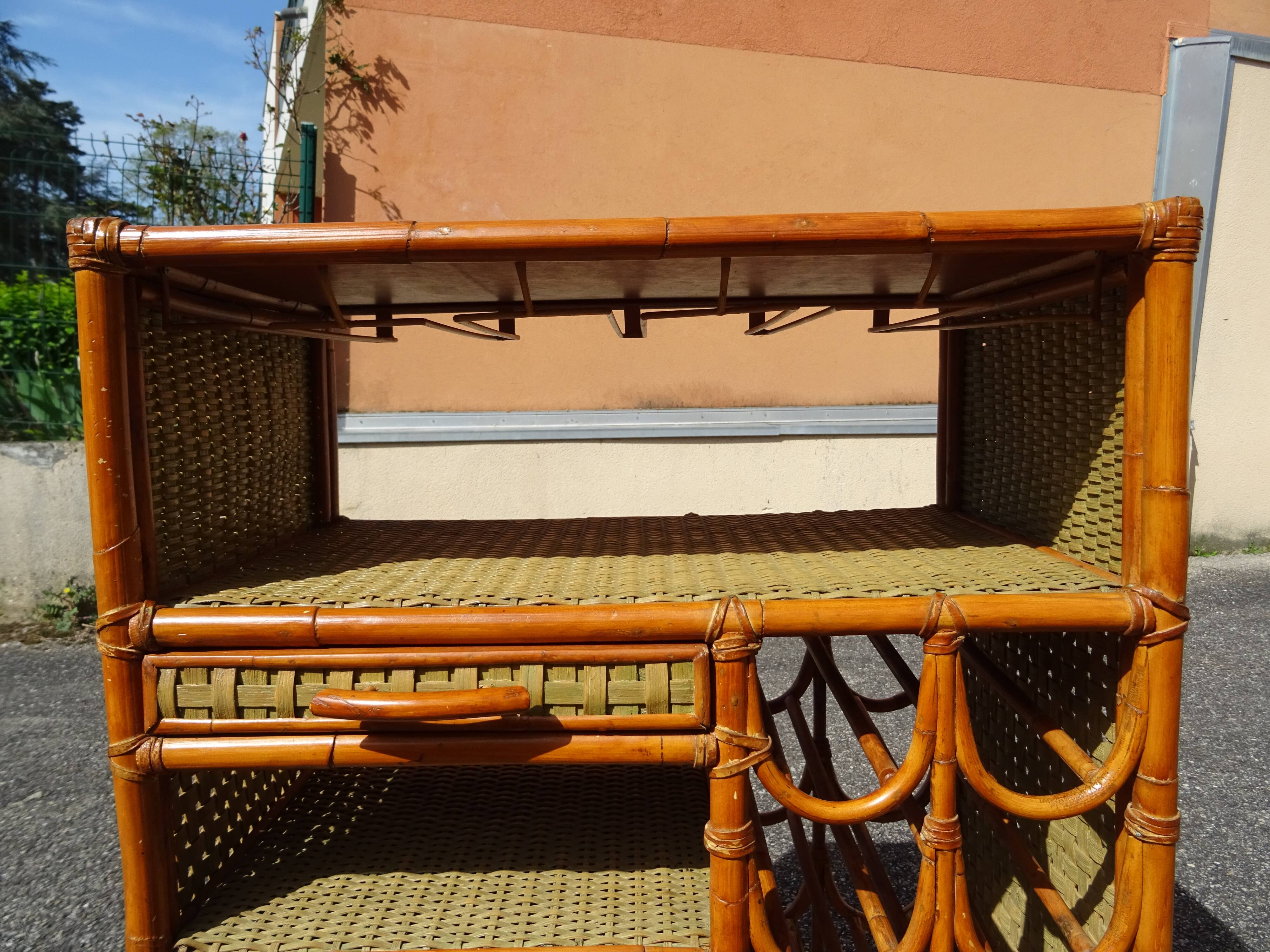 Vintage rattan bar cabinet from the 60s/70s