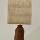 Large chamotte clay lamp in brutalist style, with a plant motif.