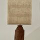 Large chamotte clay lamp in brutalist style, with a plant motif.