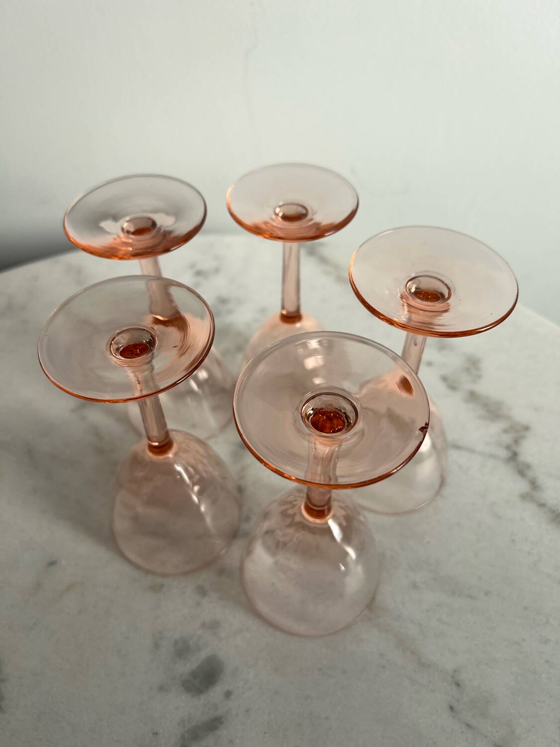 5 small pink glass stemmed glasses