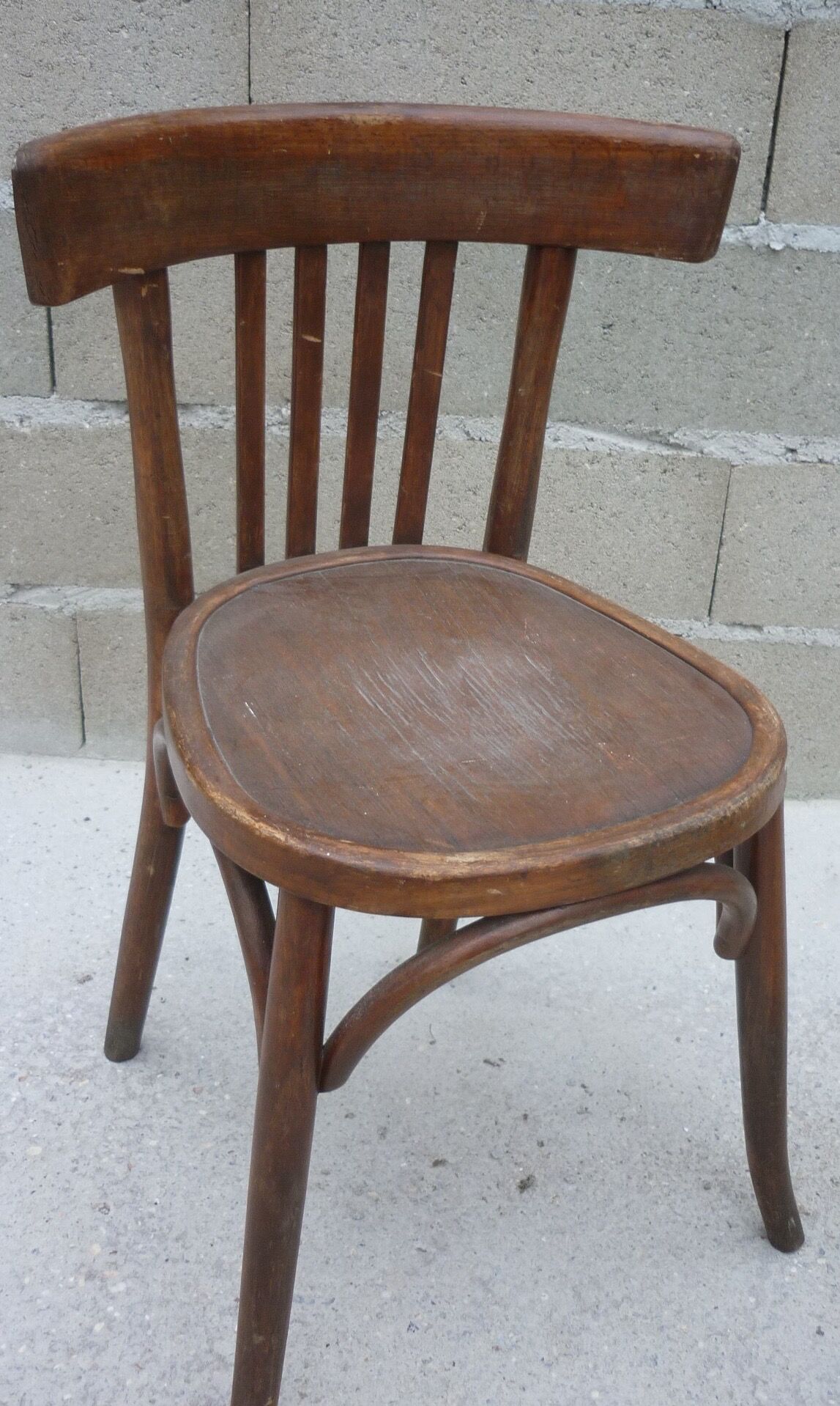Pair of old bistro chairs with dark patina