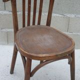 Paire de chaises bistrot anciennes avec patine foncée