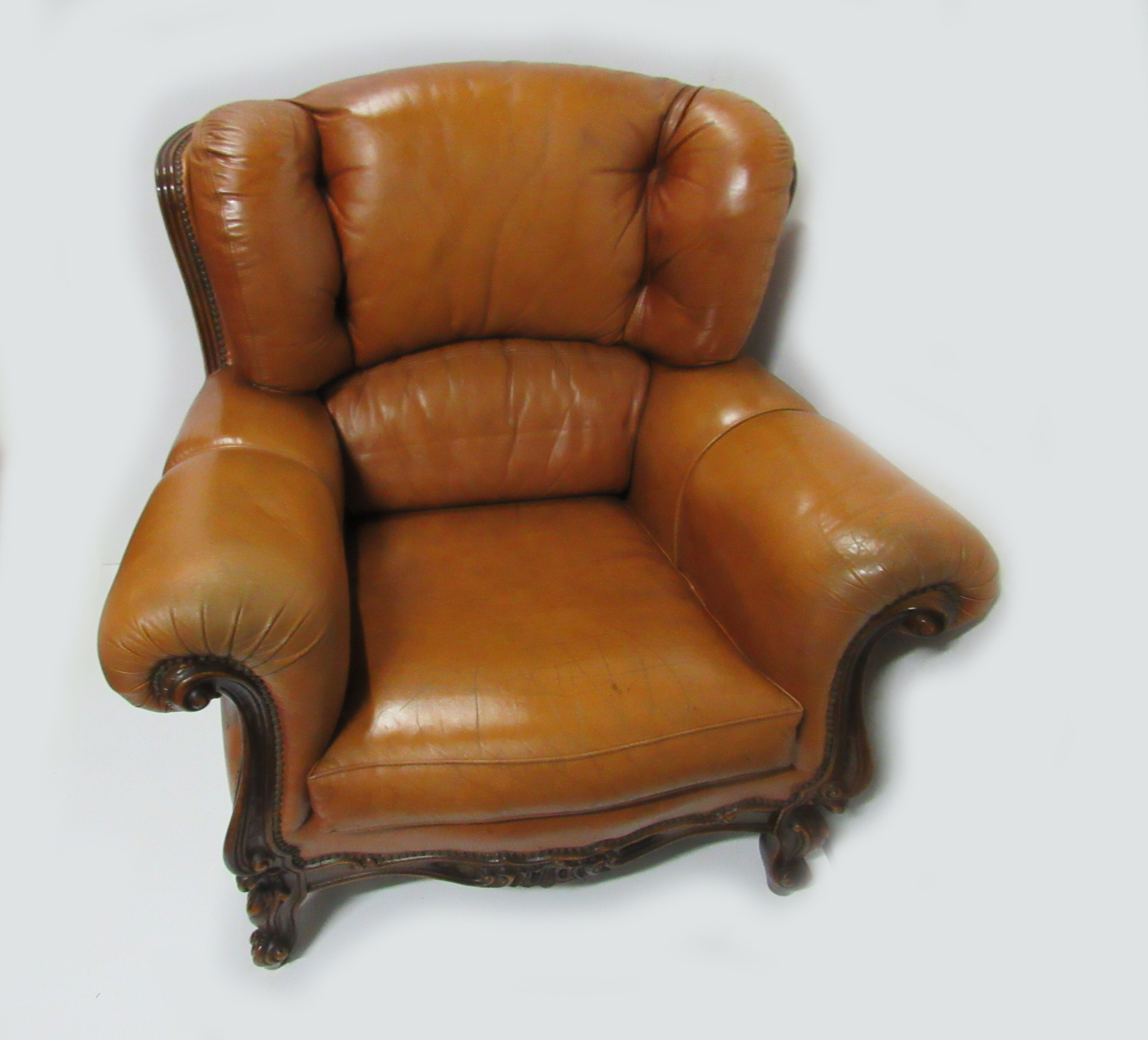 Louis XV style tawny leather chair