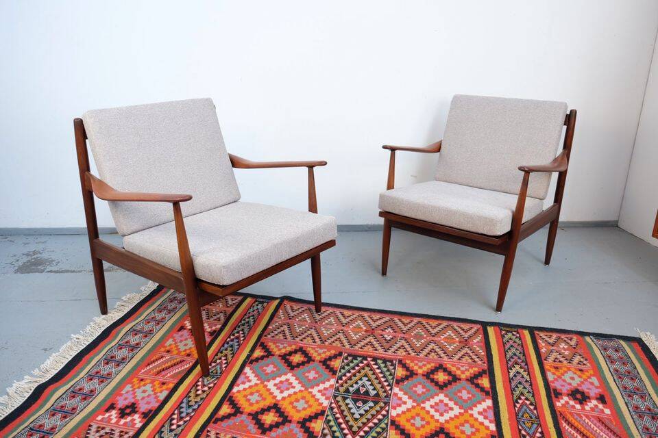 Vintage teak lounge chair, retro 1960s–70s style.