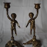 2 bougeoirs anciens chérubin en laiton