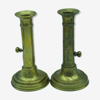Pair of old candlesticks in bronze or brass, booster button, vintage decoration