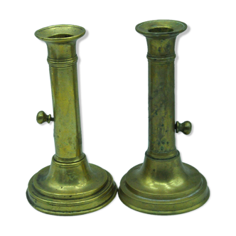 Pair of old candlesticks in bronze or brass, booster button, vintage decoration