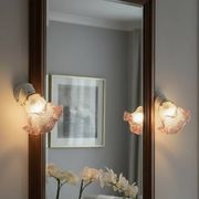 Pair of porcelain wall lights with pink glass tulips, Art Deco.