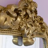Gilded mirror with a Louis Philippe style pediment