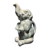 Ceramic jug in the shape of an elephant.