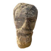 Ancienne tête en pierre