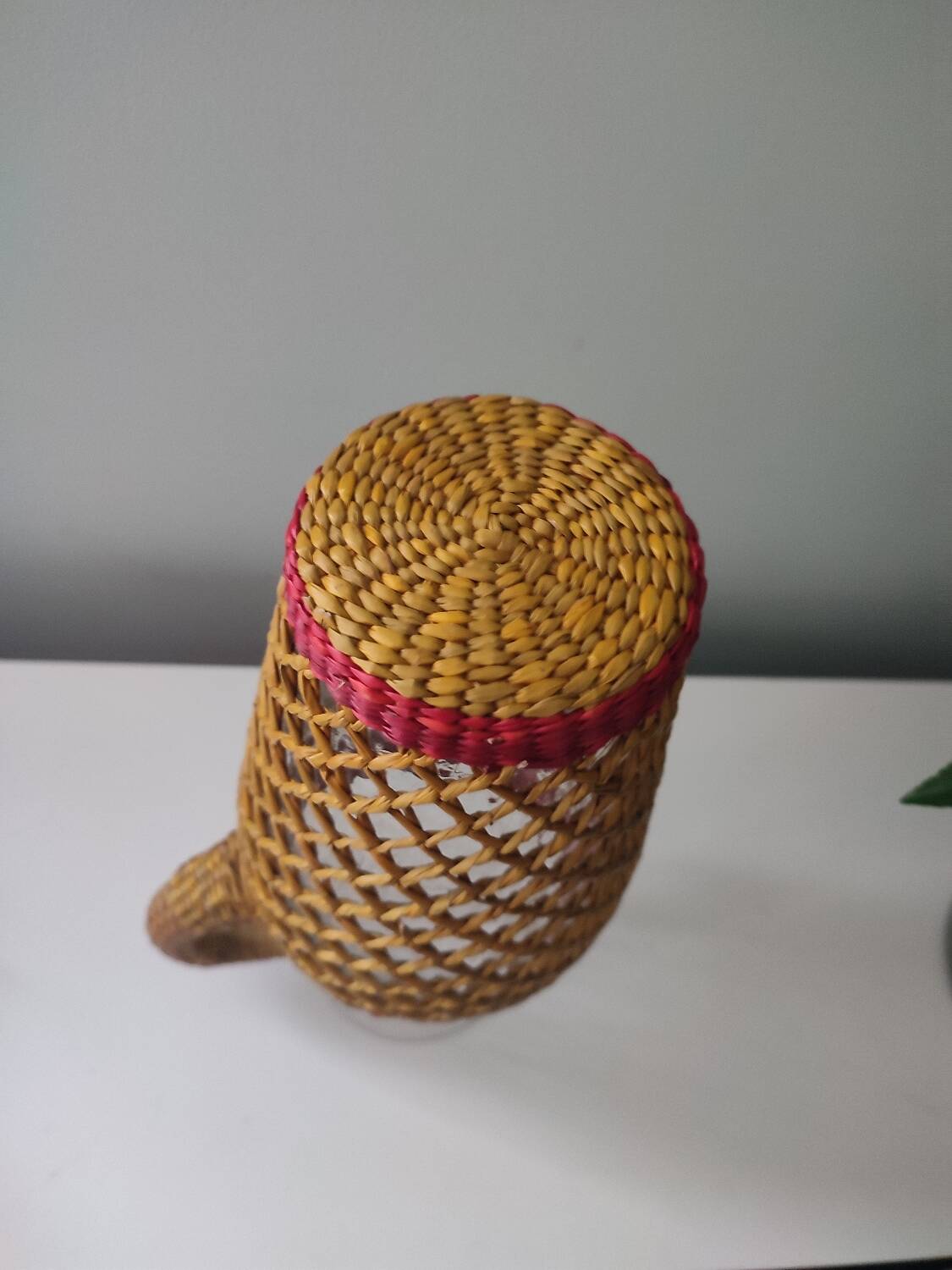 Glass and raffia water carafe